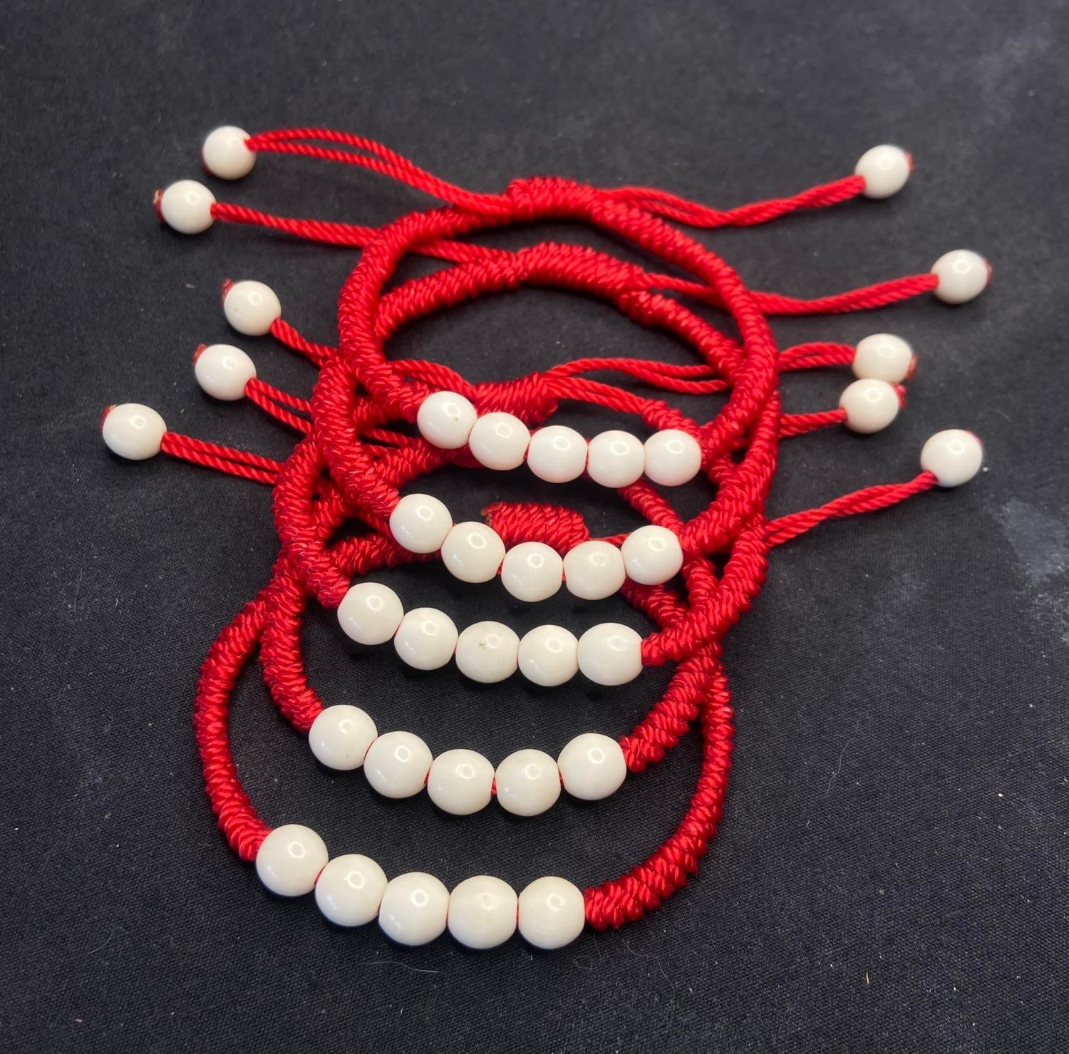 ด้ายแดงเม็ดประคำ