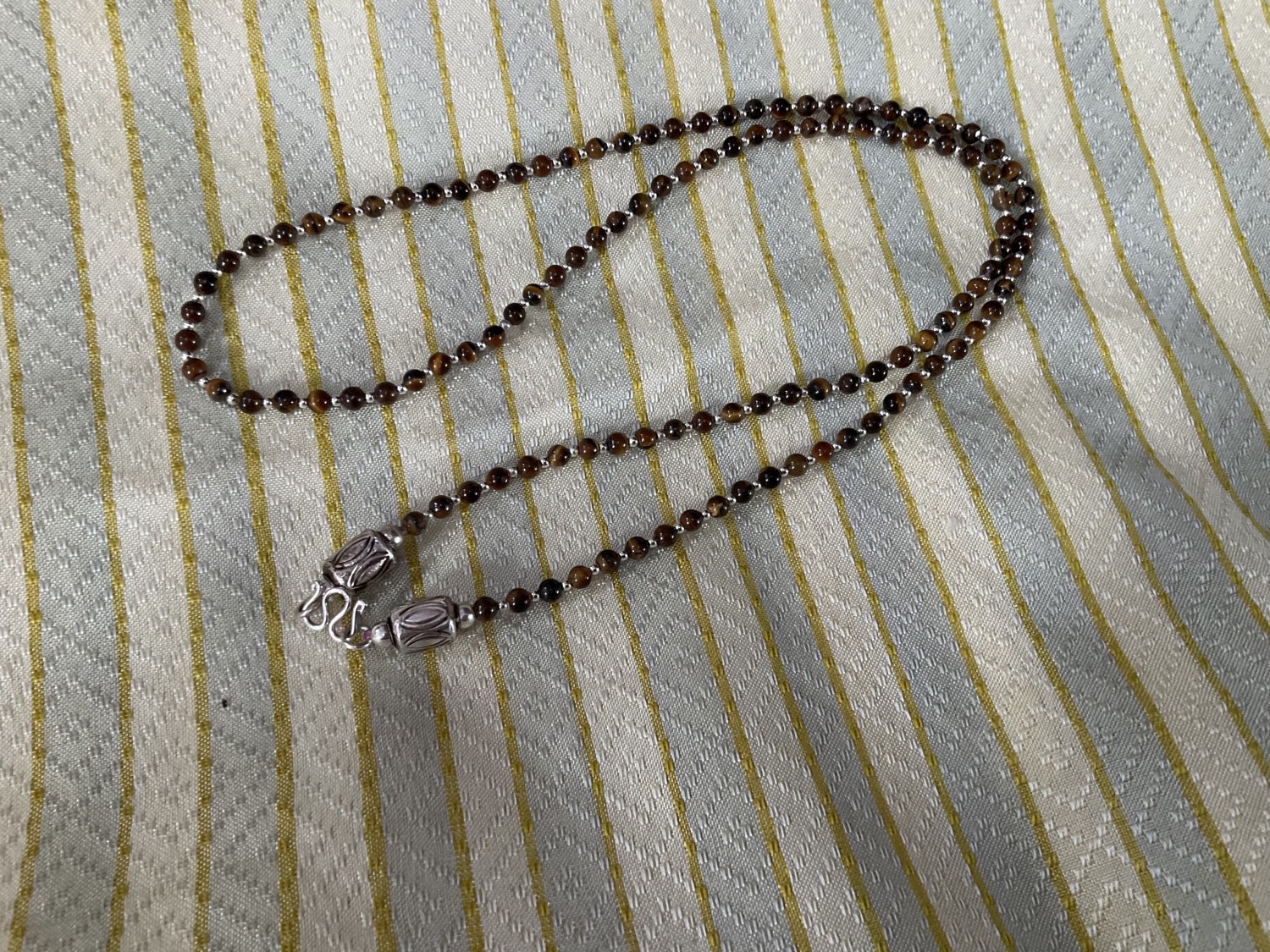 สร้อยห้อยพระหินตาเสือ