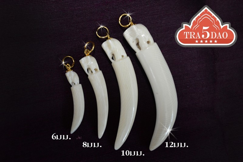 งาช้างรูปเขี้ยว หัวช้างแกะ