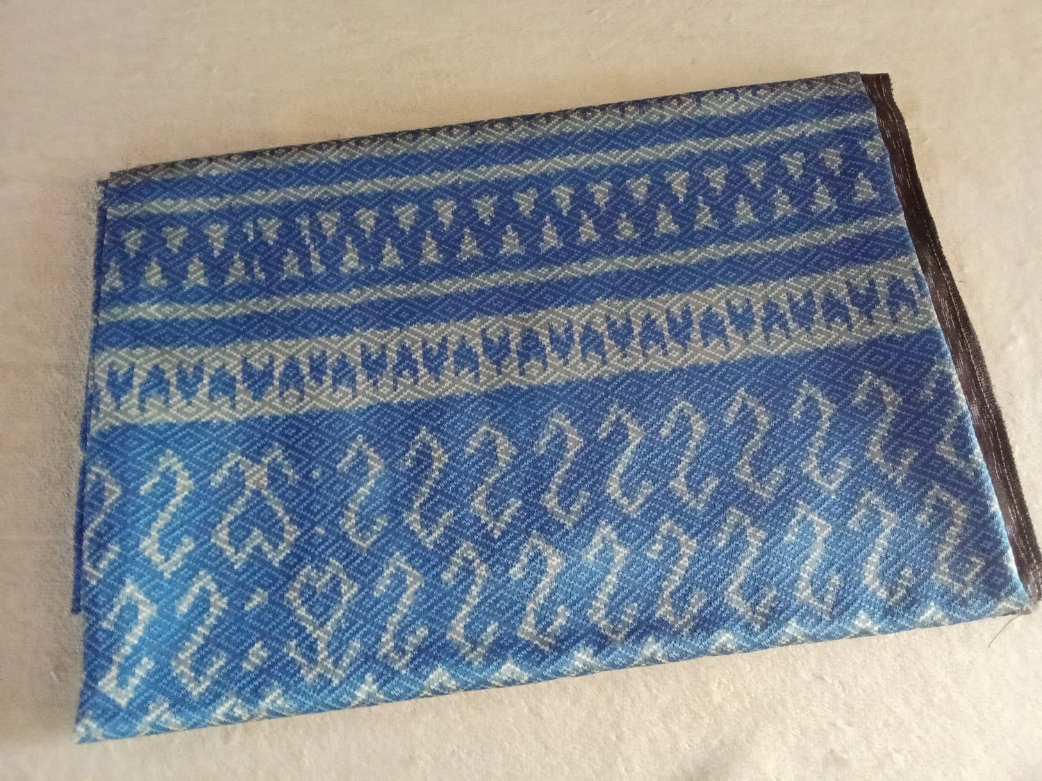 ผ้าลายขอสิริวัณวรีสีเคมี