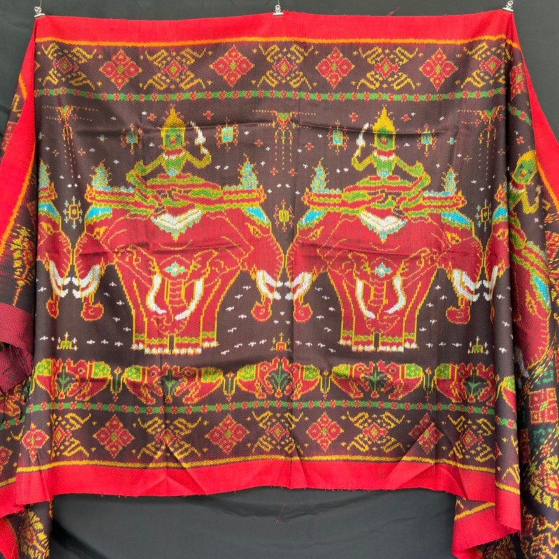 ซิ่น ผ้าไหมมัดหมี่ทอยกดอก 6ตะกอ ขนาด 1x2.20เมตร ลายพระอินทร์ทรงช้างเอราวัณ มีหน้านางชายครุย พื้นสีน้ำตาล รหัส M2A-100-0306694 รหัสสินค้า SKU-47084