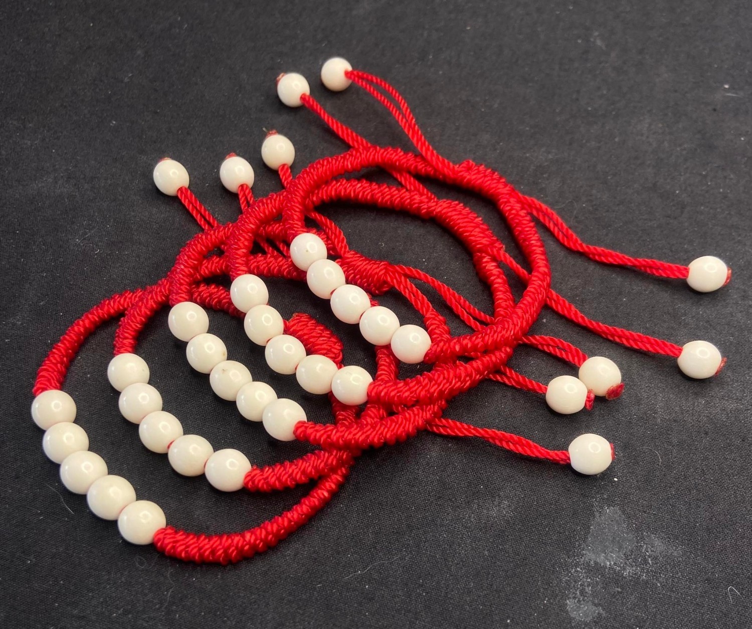 ด้ายเเดงปรับไซร์ เม็ดประคำ6มิล